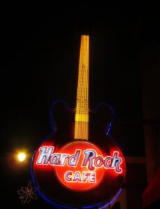 a neon sign for a Hard Rock Caffe
